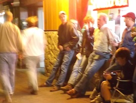 Patrons drink outside the Om Bar on New Year's Eve / Headline Surfer
